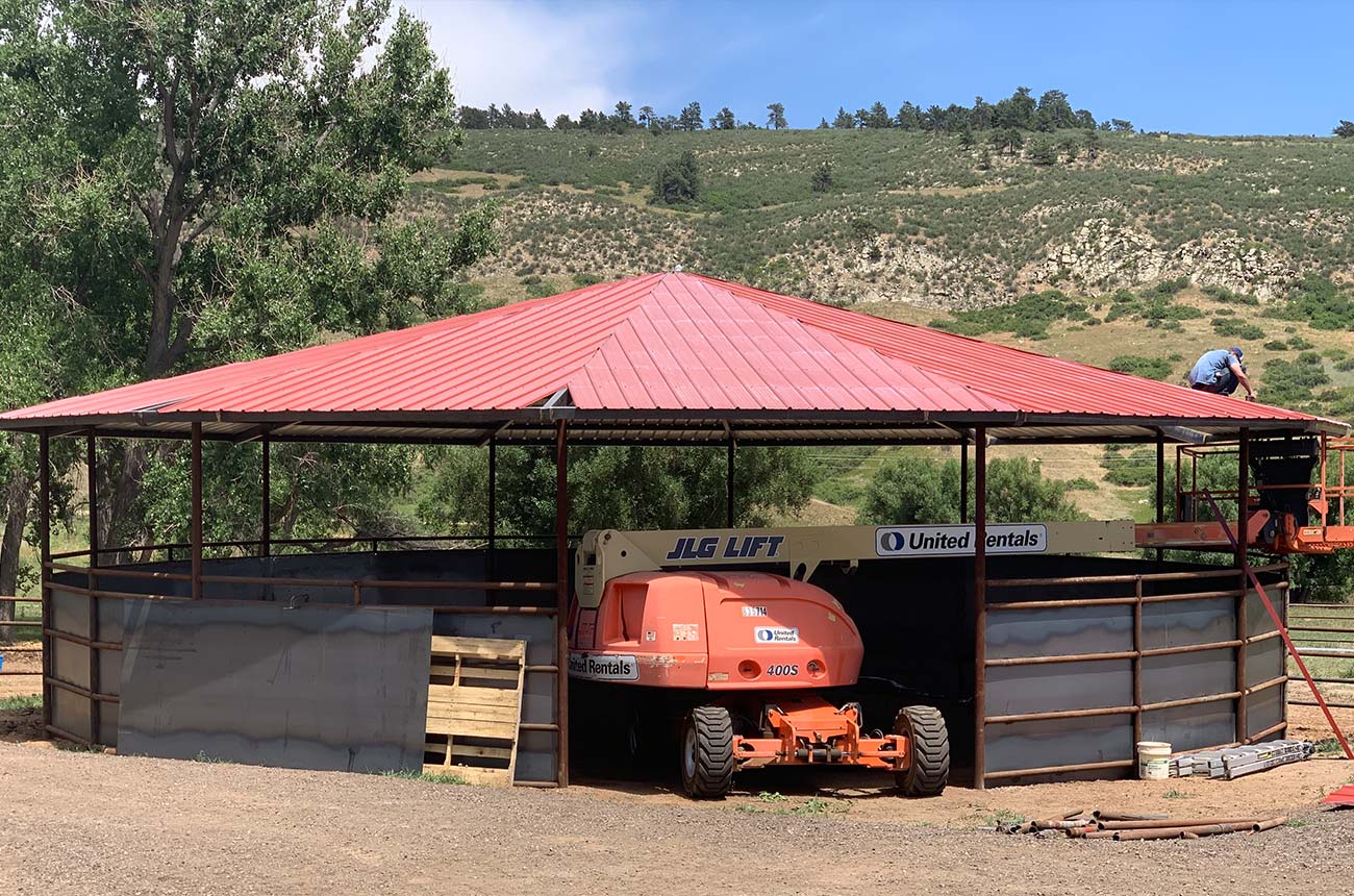 Circular weld-up metal building with partially sheet sides