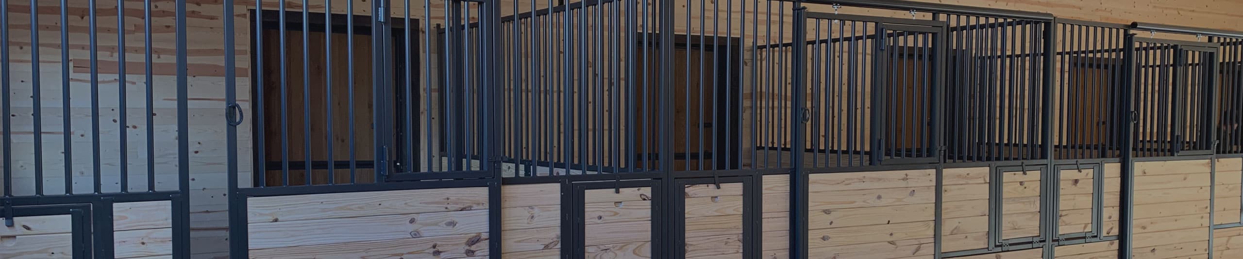 Get an estimate for custom metal and wood barn stalls and barn doors.